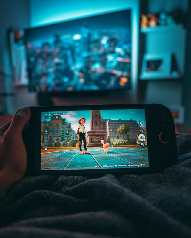 Handheld gaming console with TV display